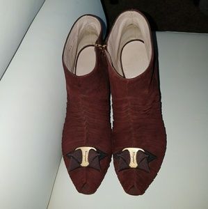 Salvatore ferragamo booties two pairs. One pair is burgundy Cream color.